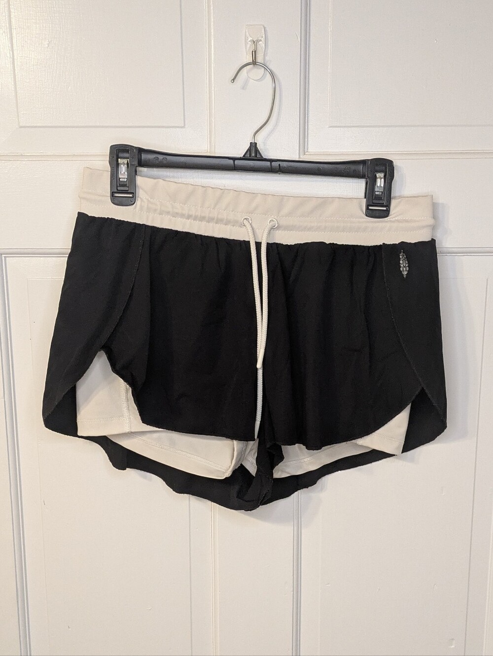 Free People Black and White Dolphin Split Hem Shorts with Drawstring and Pockets